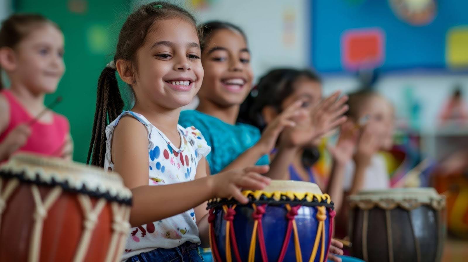A group of children happily drumming in a classroom, engaging in a fun, collaborative activity