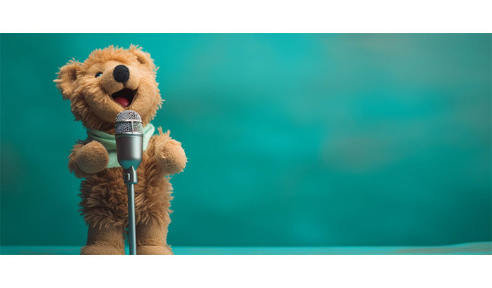 Teddy bear singing on a microphone, surrounded by Musical Teddy Bears, Children with Autism, and Stuffed Animal.